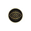 Decorative emblem with an eye design in the center on a black background